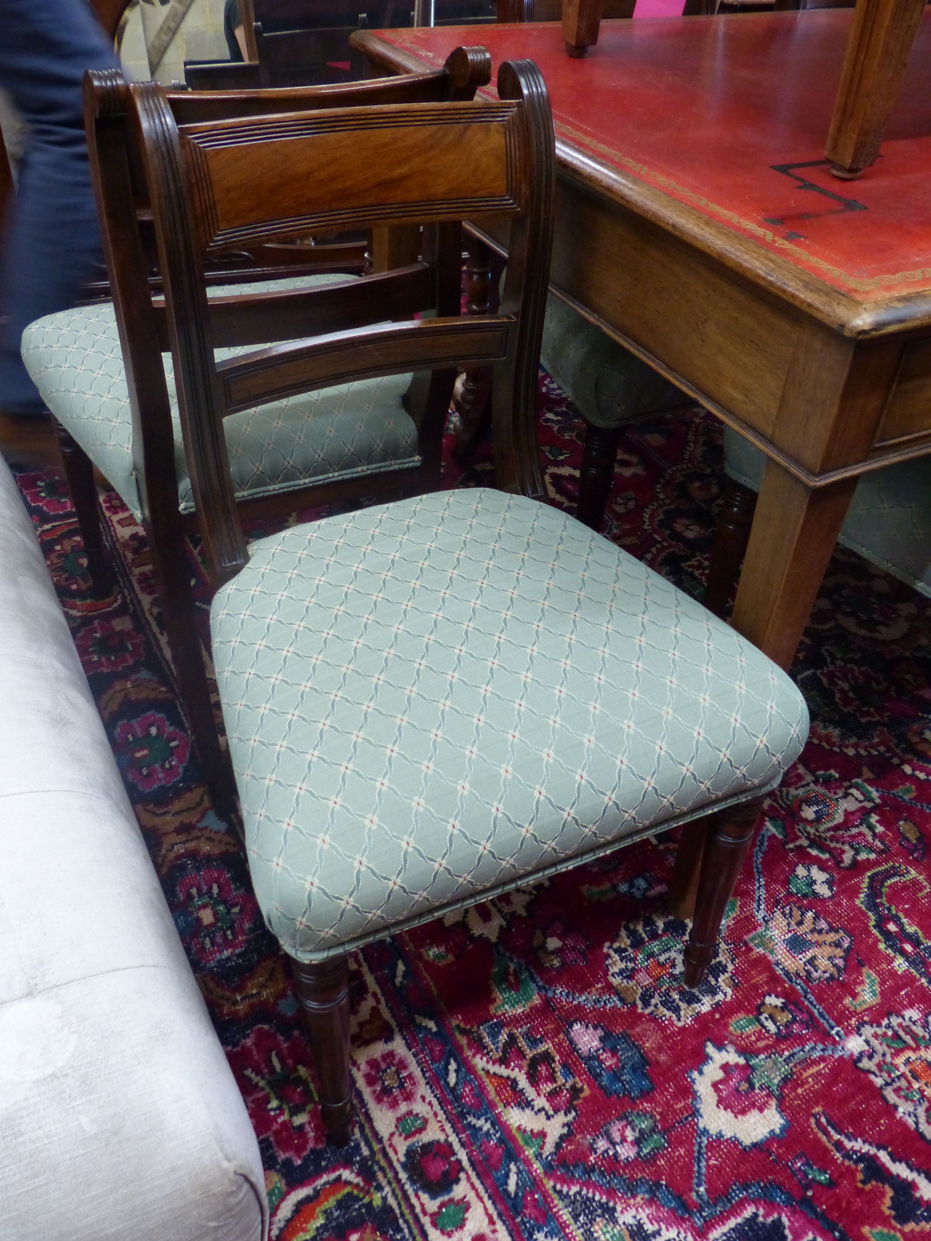 A set of six Regency mahogany dining chairs